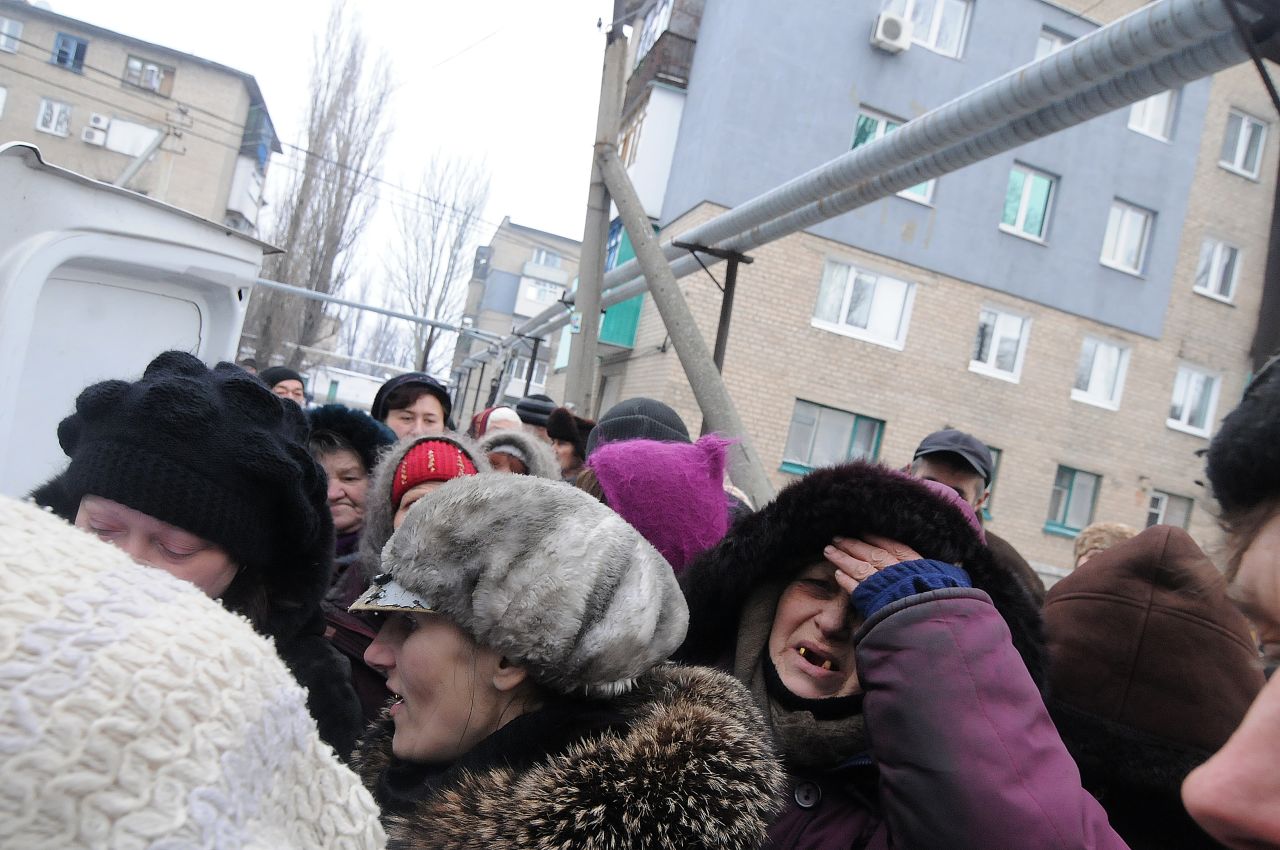 Residents desperate for food wait their turn. Only an estimated 3,000 remain from a city that normally has 25,000 residents. Pro-Russian forces have been attempting to encircle the city from the north.