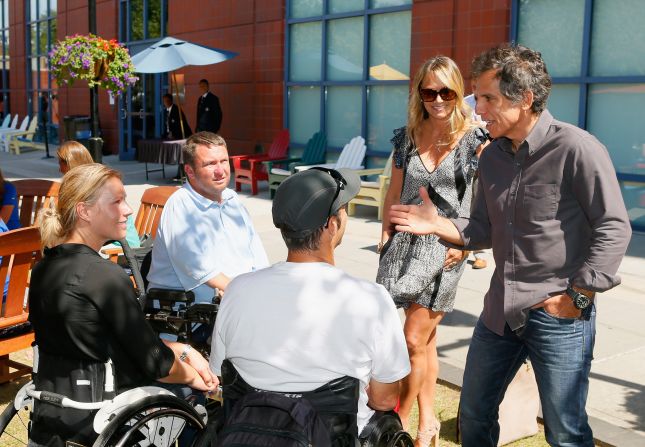 Since retiring Esther Vergeer has been working to promote more integrated tennis tournaments. Here she meets actor Ben Stiller (R) and his wife Christine Taylor at the U.S. Open in New York. All four grand slams stage wheelchair and able-bodied events.