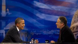 US President Barack Obama (L) tapes an interview for the satirical television show "Daily Show" with Jon Stewart (R) at the Harman Center for the Arts in Washington, DC, October 26, 2010. Obama is the first sitting president to appear on the program hosted by Stewart, whose nightly skewerings of political hypocrisy and US media shortcomings have endeared him to young Democrats.        AFP PHOTO/Jim WATSON (Photo credit should read JIM WATSON/AFP/Getty Images)