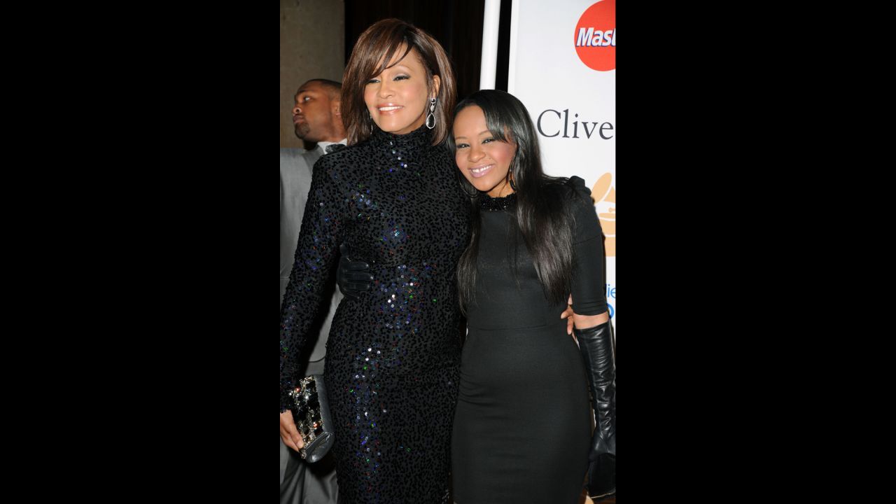 Houston and her daughter, Bobbi Kristina Brown, arrive at a gala event honoring David Geffen in February 2011.