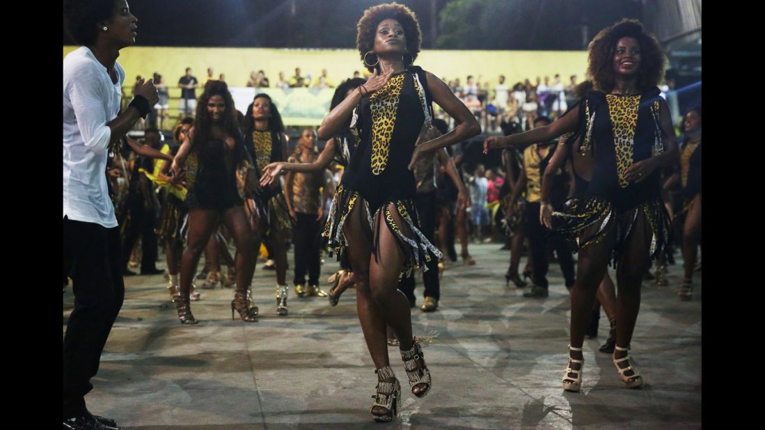 Samba dancers rehearse Tuesday, February 10, ahead of Carnival celebrations in Rio de Janeiro.
