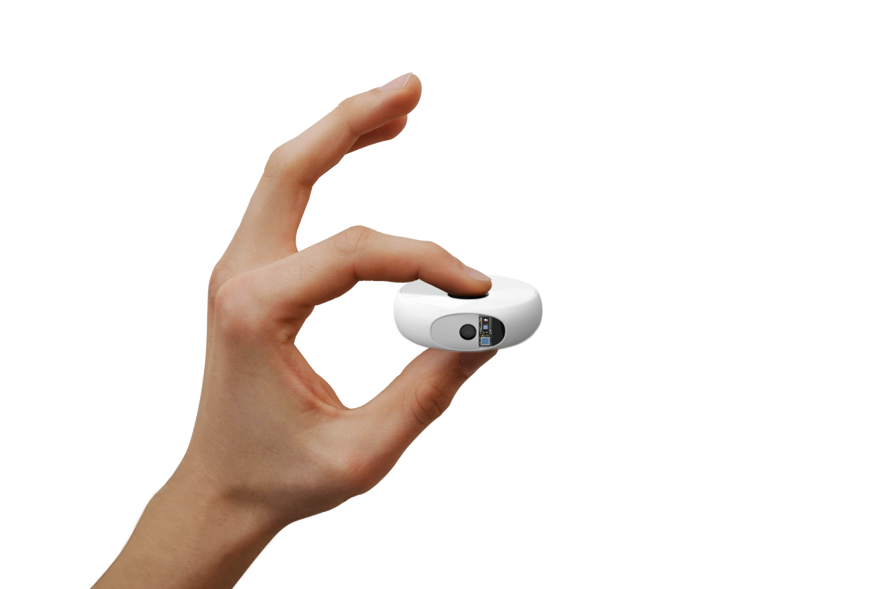 The tiny Scanadu Scout sensor takes vital signs in seconds, by simply placing it on one's forehead.