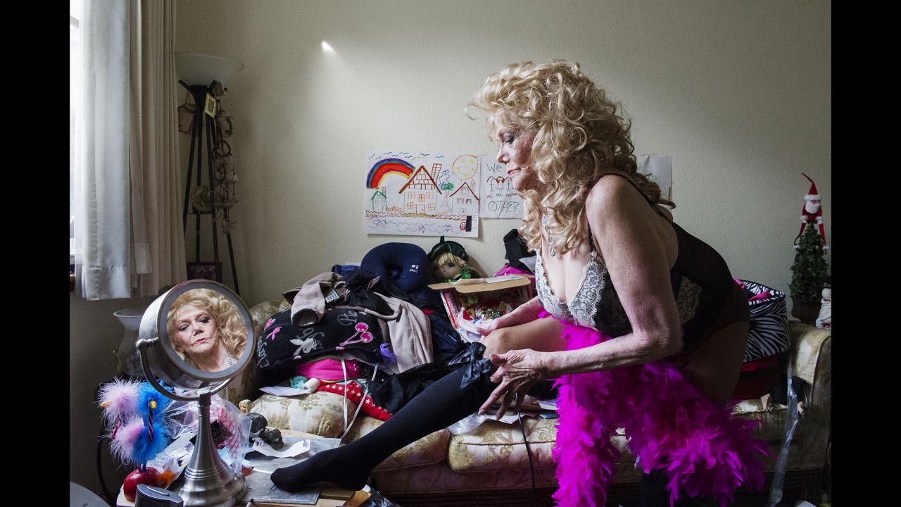 Ellion Ness gets dressed in San Francisco in 2012. Burlesque is known for its elaborate costumes and routines.