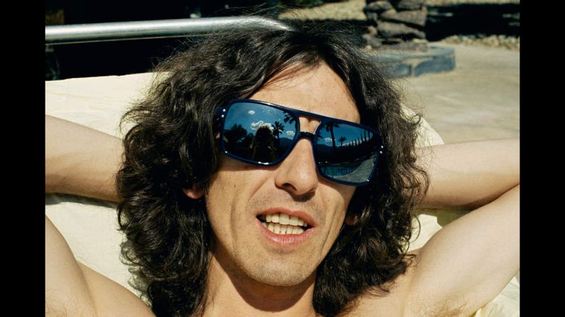 Harrison is captured sunbathing in Palm Springs during a quick holiday break he and Boyd took together in the California desert resort town between recording sessions in Los Angeles. This was near the time of the "Living in the Material World" album cover shoot in Los Angeles.