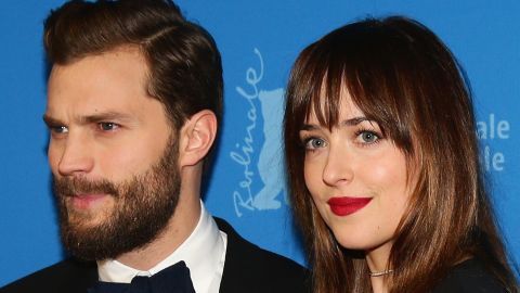 Stars Jamie Dornan and Dakota Johnson attend the "Fifty Shades of Grey" film premiere in Berlin.