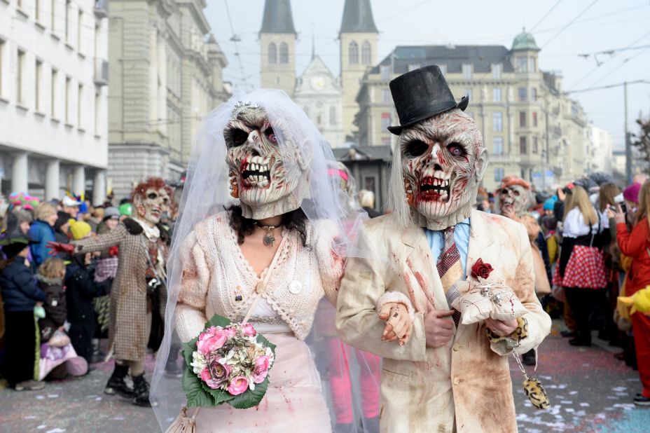 Masked revelers parade through the streets of Lucerne, Switzerland, on February 12. 