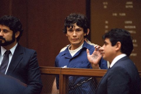 Consultant Dimitrius says the longest jury selection might belong to the trial of Richard Ramirez, known as "the Night Stalker." It took nine months to seat a jury in the capital murder case against Ramirez. His spree of serial murders, rapes and home invasions terrified Los Angeles and San Francisco in the mid-1980s. He received 13 death sentences but died of cancer in prison. In this 1985 courtoom photo, Ramirez displays a pentagram symbol on his hand. 