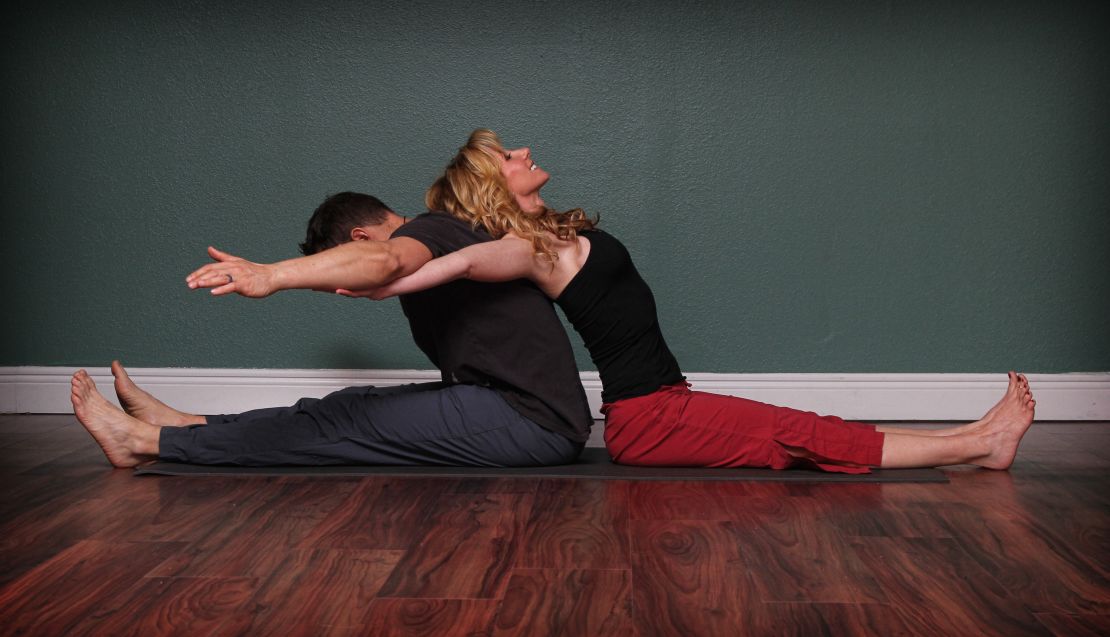 This yoga position lengthens low-back and hamstrings, alternately opens chest and front of shoulders