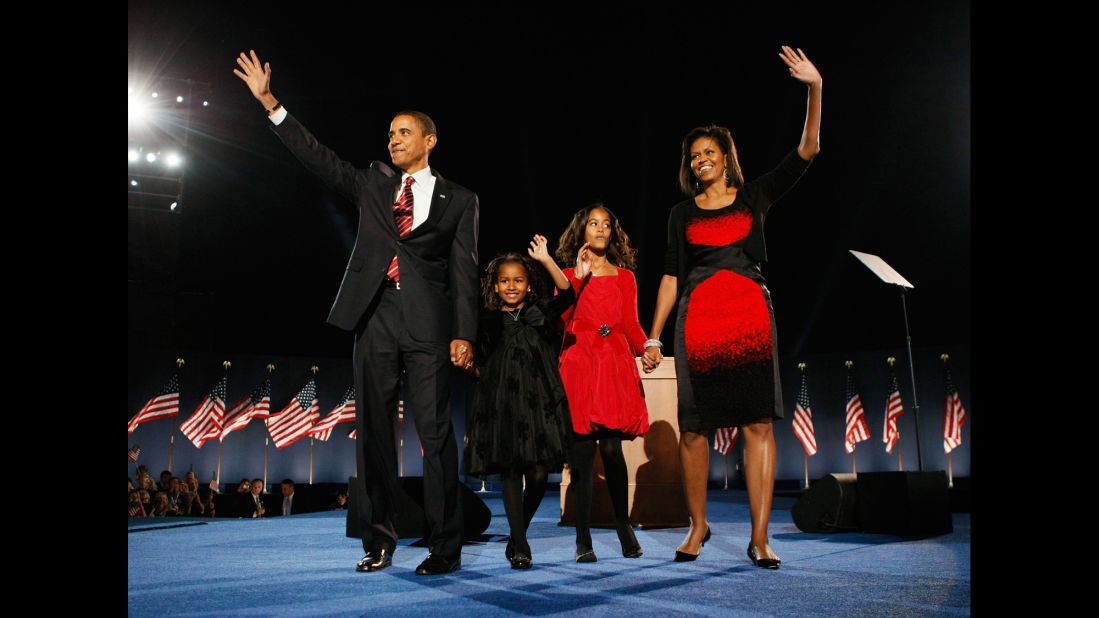 Obama stands on stage in Chicago with his family after winning the presidential election on November 4, 2008.