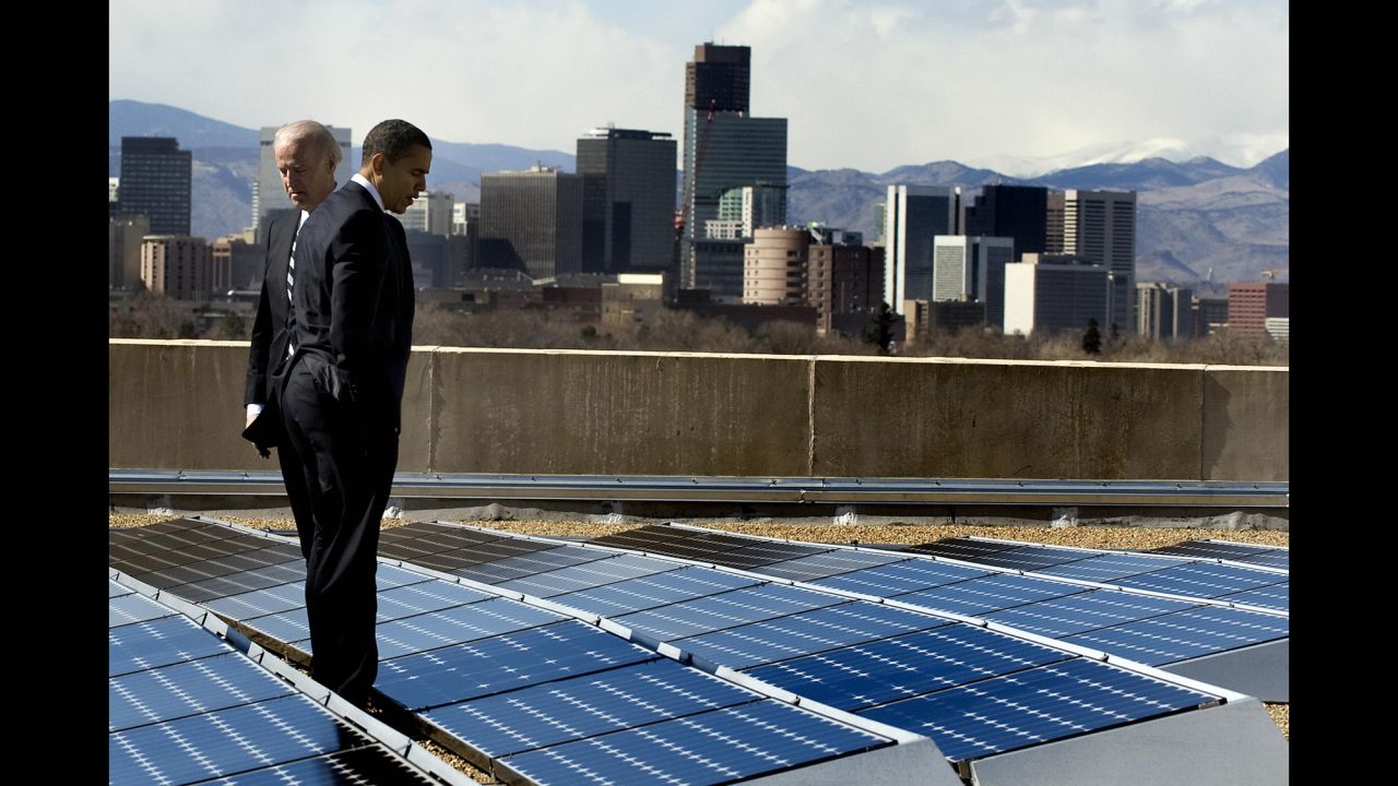 Obama and Vice President Joe Biden look at solar panels as they tour the solar array at the Denver Museum of Nature and Science on February 17, 2009. That same day, Obama signed the American Recovery and Reinvestment Act.