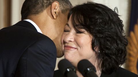 Obama kisses Sonia Sotomayor's cheek after announcing her as his nominee for Supreme Court justice in May 2009.