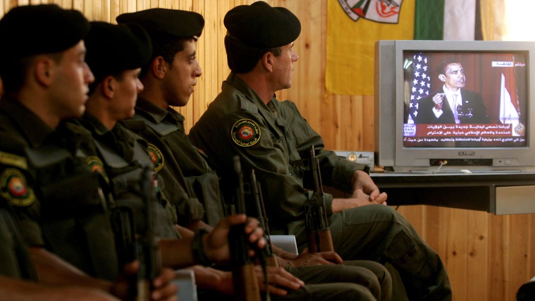 Palestinian security forces in Jenin, West Bank, listen to Obama speak from Cairo University in Egypt in June 2009. The Palestinian Authority hailed as a "good beginning" Obama's speech to the Muslim world in which he reiterated his support for a Palestinian state.
