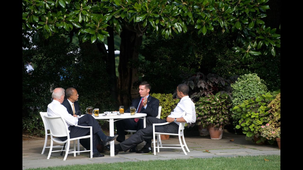 Police Sgt. James Crowley, second right, of Cambridge, Massachusetts, speaks with Harvard Professor Henry Louis Gates Jr., second left, alongside Obama and Biden as they share beers on the South Lawn of the White House in July 2009. The so-called Beer Summit was held after Crowley arrested Gates at his own home, which sparked tensions and racial furor.