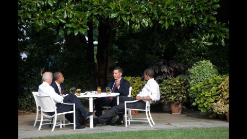 Police Sergeant James Crowley, second right, of Cambridge, Massachusetts, speaks with Harvard Professor Henry Louis Gates Jr., second left, alongside Obama and Biden as they share beers on the South Lawn of the White House in July 2009.