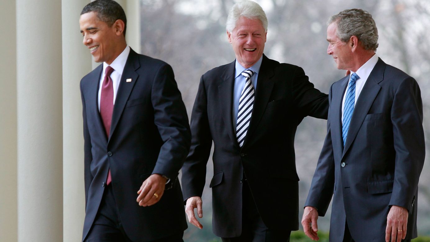 Obama and former Presidents Clinton and George W. Bush walk to the White House Rose Garden to speak about relief efforts for earthquake-stricken Haiti in January 2010.