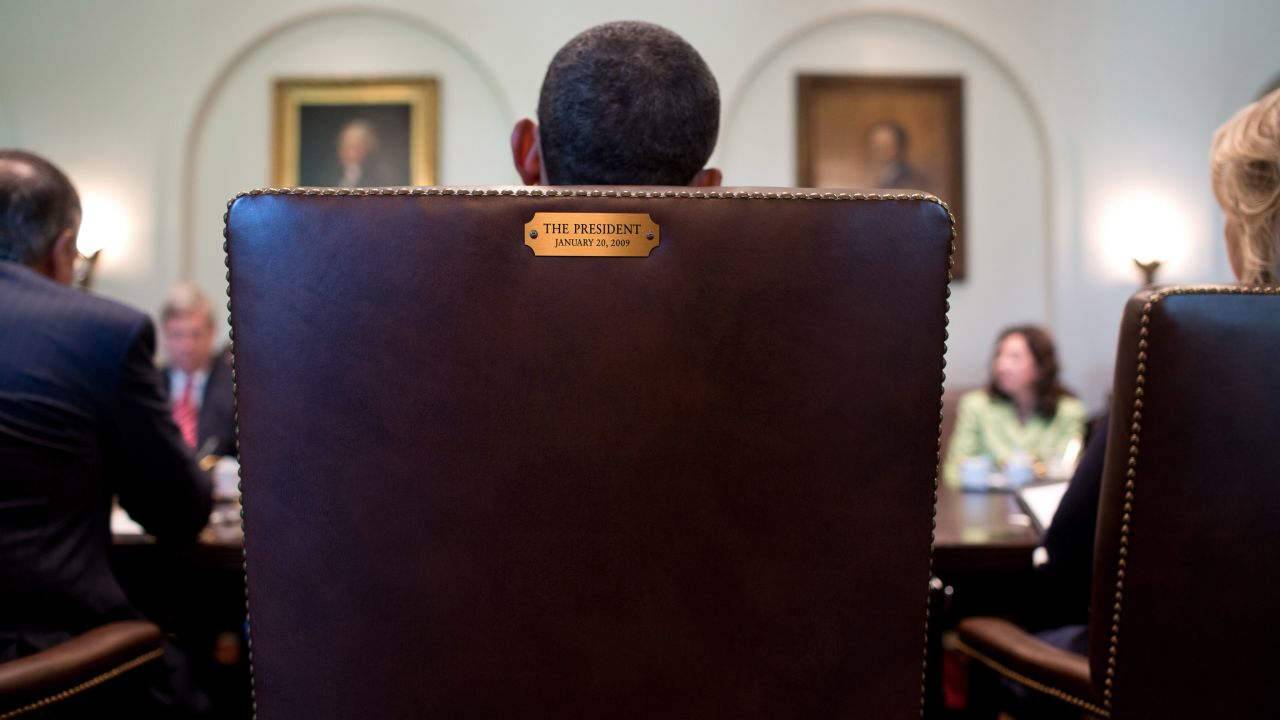 Obama sits in his chair during a Cabinet meeting in July 2012. This image was tweeted by his official Twitter account in August 2012 in response to <a href="http://www.cnn.com/2012/08/31/politics/eastwood-speech/" target="_blank">Clint Eastwood's "empty chair" speech</a> at the Republican National Convention. The tweet simply said, "This seat's taken."