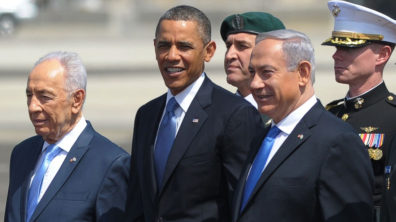 Israeli President Shimon Peres, left, and Prime Minister Benjamin Netanyahu, right, stand with Obama after Obama arrived in Tel Aviv, Israel, in March 2013.