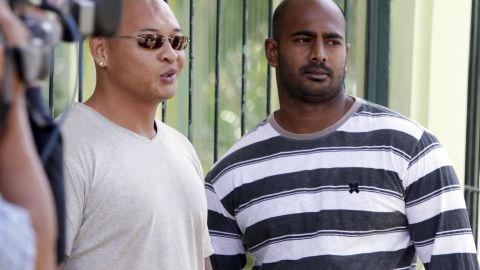 Australian death-row prisoners Myuran Sukumaran (r) and Andrew Chan (l) stand in front of their cell during an Indonesian Independence Day celebration at Kerobokan prison in Bali, Indonesia in 2011.