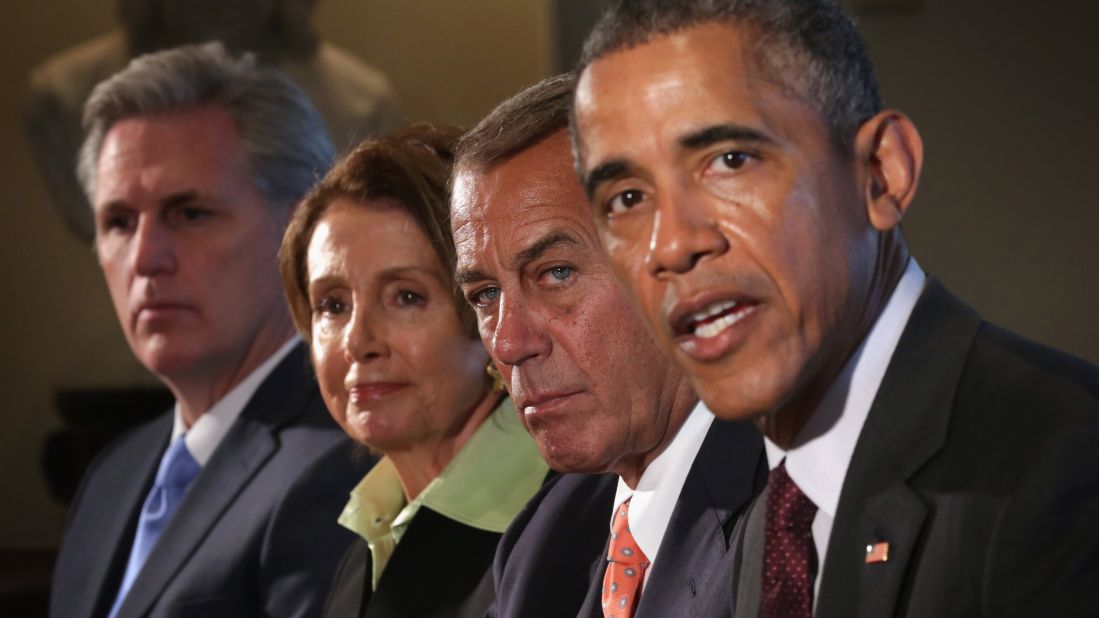 From left, House Majority Leader Kevin McCarthy, House Minority Leader Nancy Pelosi and House Speaker John Boehner listen as Obama speaks during a meeting in the Cabinet Room of the White House on January 13, 2015. 
