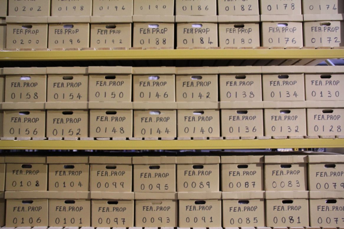 This is how most of the warehouse usually looks -- items packed carefully into neatly labeled boxes, protected by acid-free paper. The boxes stretch all the way up to the ceiling, looking a bit like the last scene from "Raiders of the Lost Ark."