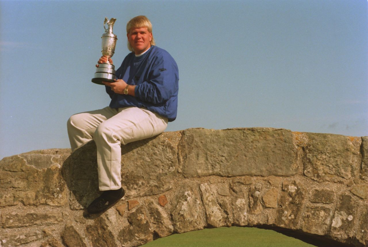The trend of standing out on the links has been given new meaning by former Open champion John Daly in recent years. Although when he posed on St. Andrews' Swilcan Bridge with the Claret Jug in 1995, he wasn't quite so colorfully dressed. 