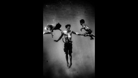 Photographer Guillem Valle took underwater portraits of them as part of a larger project about stateless people.