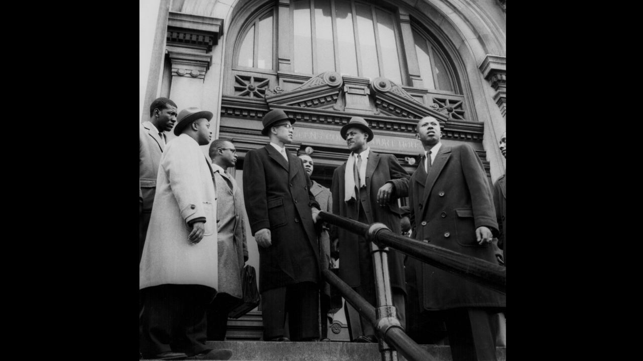 Malcolm X was never afraid to speak out against injustices he said black Americans were facing. In this photo, taken outside a New York courthouse, he offers his support during a police brutality case.