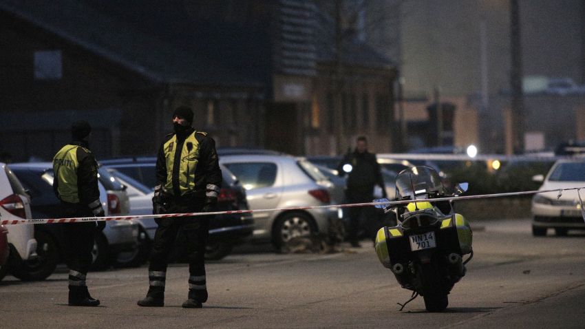 Policemen secure the area around a building in Copenhagen, Denmark, where shots were fired on February 14, 2015 outside the venue of a debate held on Islam and free speech. According to Danish media, the French ambassador to Denmark attended the discussion. Unidentified assailants fired on a building where the debate was being held, the French ambassdor to Denmark told AFP from inside the venue. Reports said that Swedish artist Lars Vilks, the author of controversial Prophet Mohammed cartoons published in 2007 that sparked worldwide protests, was also at the debate. AFP PHOTO / MARTIN SYLVEST / SCANPIX DENMARK +++ DENMARK OUT (Photo credit should read MARTIN SYLVEST/AFP/Getty Images)