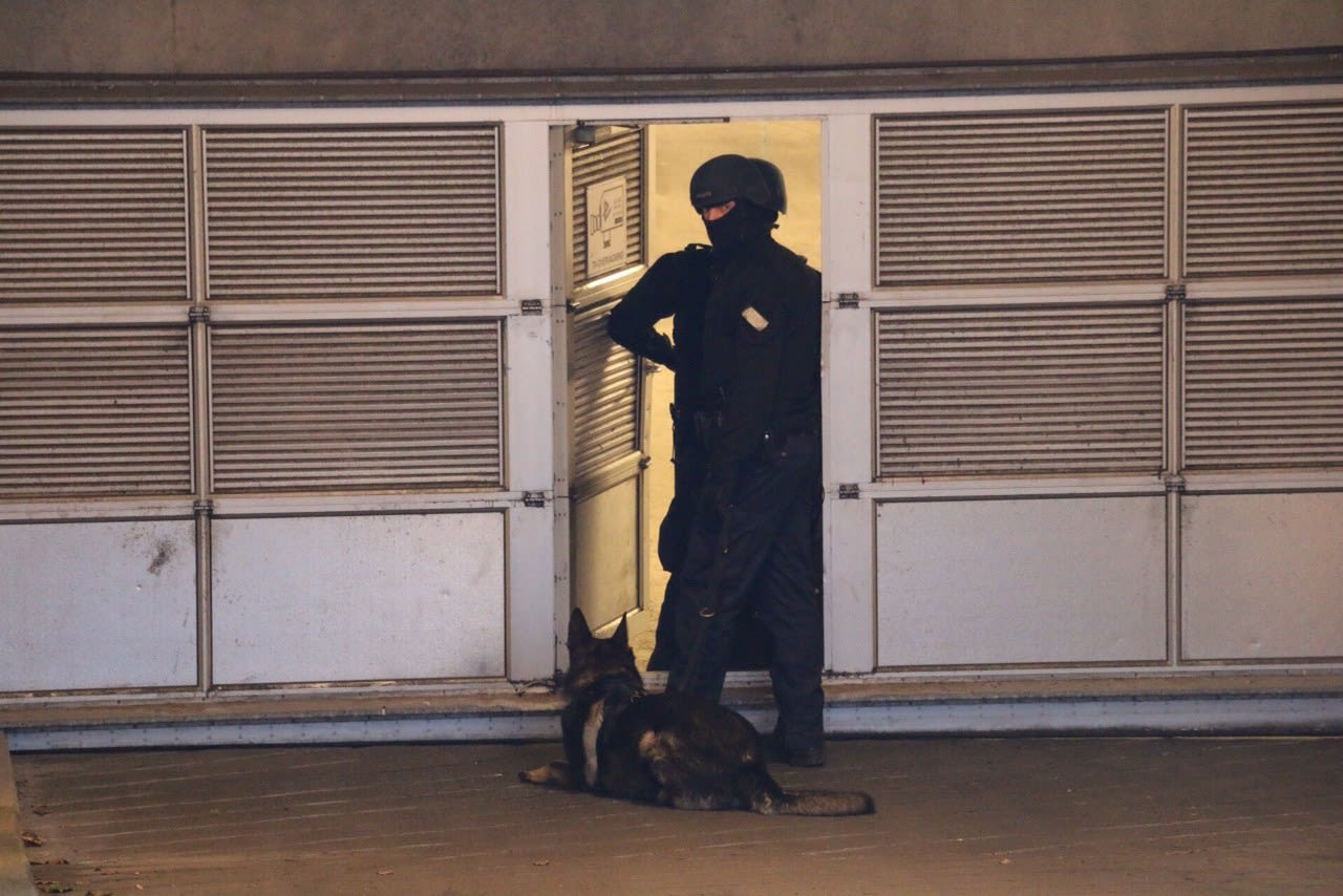 According to police, the gunmen stormed the Copenhagen building, firing shots before driving away from the scene, police and witnesses said.