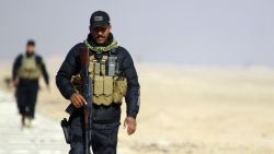 Iraqi security forces patrol the Najaf governorate border on January 24, 2015.
