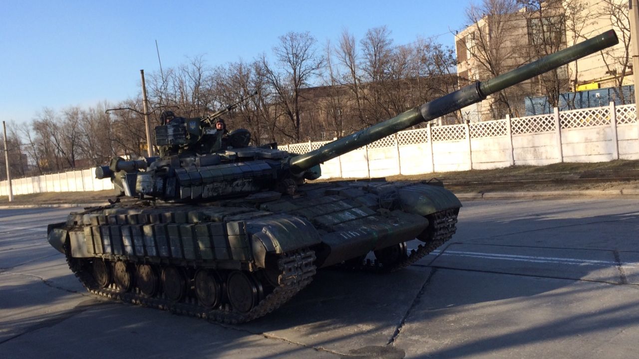 A Ukrainian tank moves towards the front line in the strategic city of Mariupol, southeast Ukraine, on February 14.