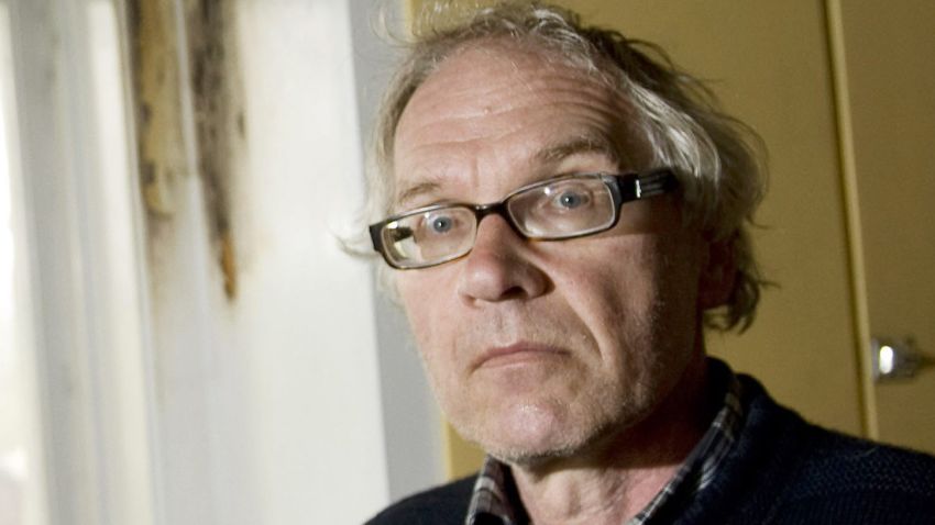 Swedish artist Lars Vilks is pictured near burn stains in his kitchen at his home outside of Hoganas on May 16, 2010. Police arrested two suspects after an attempted fire-bomb attack on the home of a Swedish cartoonist Lars Vilks, controversial for drawing the Prophet Mohammed with the body of a dog, they said today. Both suspects, aged 21 and 19, are Swedish nationals of Kosovar origin, from the southern city of Landskrona, and have been detained after personal items were found near the scene. AFP PHOTO/SCANPIX/Bjorn Lindgren (Photo credit should read BJORN LINDGREN/AFP/Getty Images)