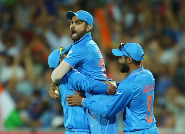 Man of the match Virat Kohli celebrates after catching Shahid Afridi during his side's 76-run victory over Pakistan in 2015.