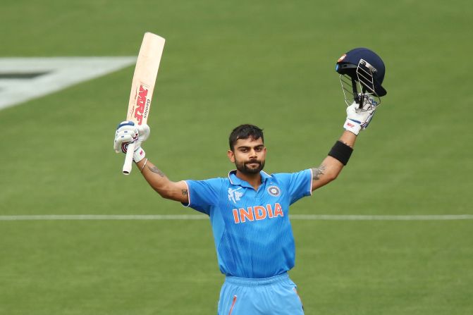 Man-of-the-match Virat Kohli celebrates his 22nd one-day international century as India beats Pakistan by 76 runs in a World Cup opener.
