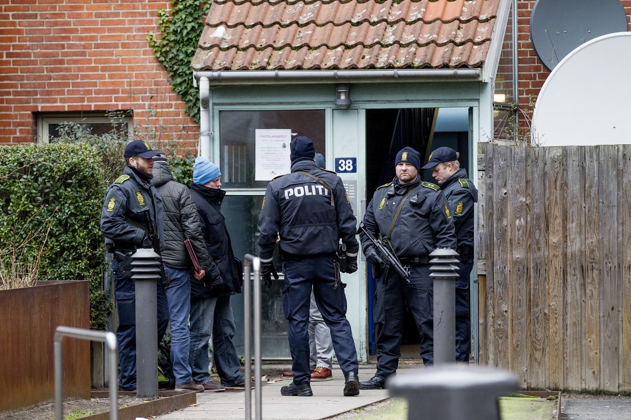Danish police search an apartment in Copenhagen on February 15. 