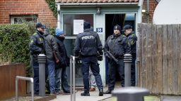 Danish police search an apartment in Copenhagen, Denmark on February 15.