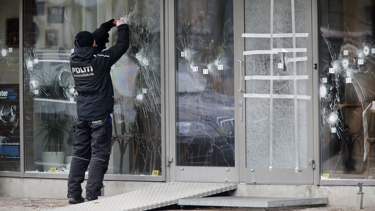 A police investigator works at the scene of Saturday's shooting at a free speech event in Copenhagen, on February 15.