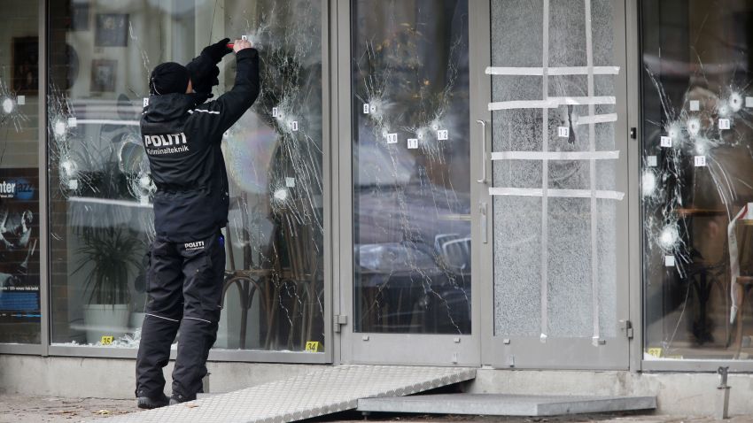 A police investigator works at the scene of Saturday's shooting at a free speech event in Copenhagen, on February 15.