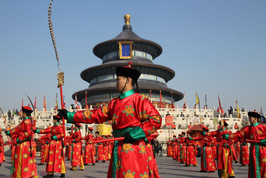 Chinese performers re-enact a traditional Qing Dynasty ceremony on Saturday, February 14, in which emperors prayed for good fortune at the Temple of Heaven in Beijing.