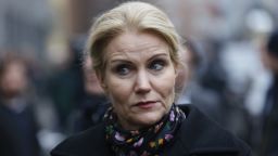 Dansh Prime Minister Helle Thorning-Schmidt pays respects Sunday Feb. 15, 2015, at the Copenhagen Synagogue for the victims for the Saturday night's shootings in Copenhagen. Danish police shot and killed a man early Sunday suspected of carrying out shooting attacks at a free speech event and then at a Copenhagen synagogue, killing two men, including a member of Denmark's Jewish community. Five police officers were also wounded in the attacks. (AP Photo / Thomas Borberg, Polfoto)