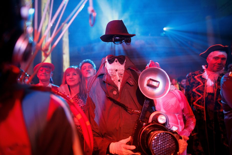 Revelers enjoy a costume party in Madrid on February 15.