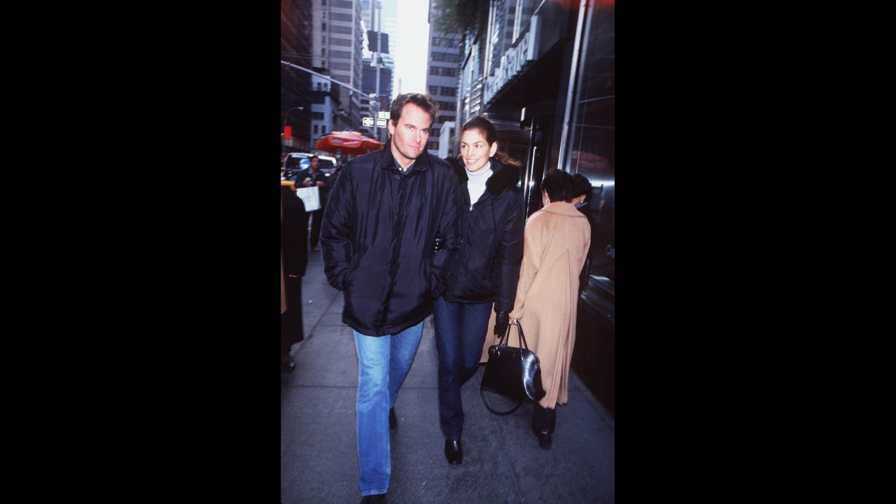 Crawford walks in New York with her second husband, businessman Rande Gerber. The couple has two children.