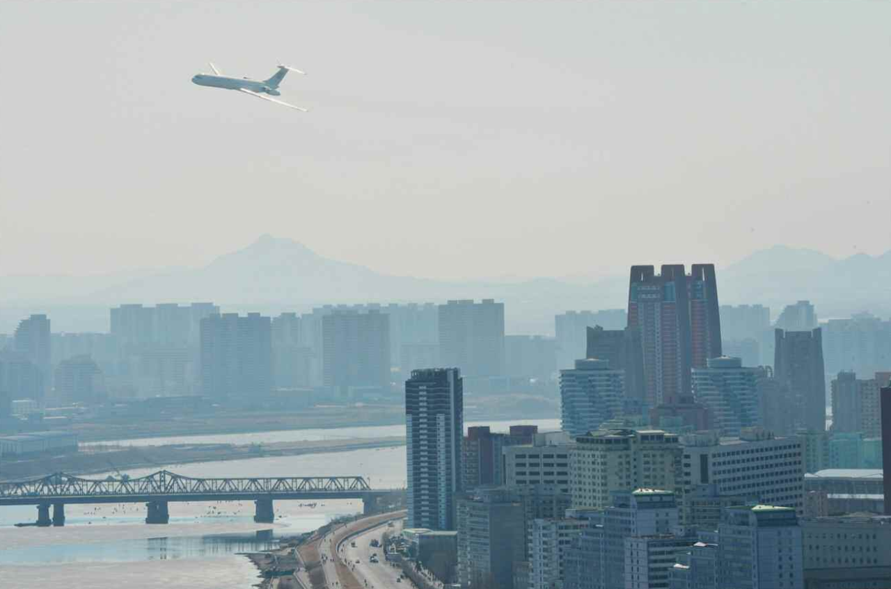KCNA released photographs showing Kim's plane flying low above Pyongyang, giving the leader a "bird's-eye view" of the construction site. 