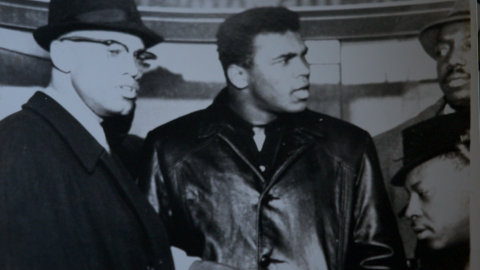 Malcolm X is shown with boxer Muhammad Ali in this image from photographer Earl Grant.