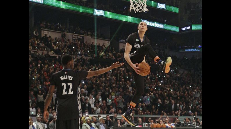Zach LaVine takes the ball from Minnesota teammate Andrew Wiggins as he participates in the NBA's Slam Dunk Contest on Saturday, February 14. LaVine defeated Victor Oladipo in the final round of the event, which was held in New York as part of the league's All-Star Game festivities.