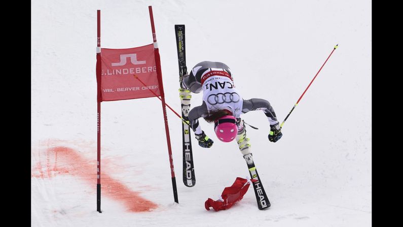 Canadian skier Candace Crawford crashes over the finish line during a run at the Alpine World Ski Championships on Tuesday, February 10. She and Team Canada still managed to win silver.