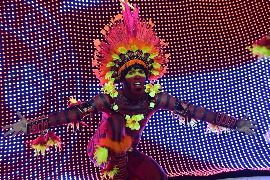 A member of the Salgueiro samba school performs during a Carnival parade February 16 at the Sambadrome in Rio de Janeiro.