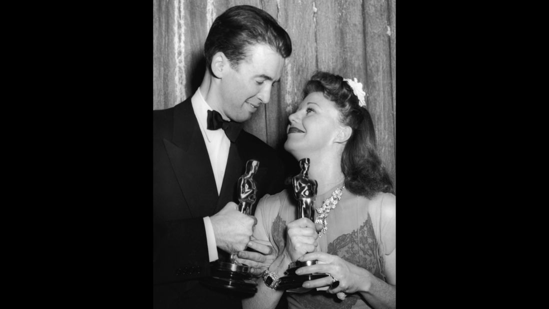 <strong>James Stewart (1941):</strong> After losing the Oscar a year earlier for his iconic role in "Mr. Smith Goes to Washington," James Stewart received the award playing a reporter who falls for Katharine Hepburn in "The Philadelphia Story." Stewart and best actress winner Ginger Rogers celebrate their wins at the ceremony held in 1941.