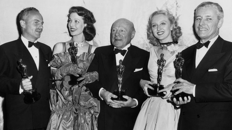 <strong>Loretta Young (1948):</strong> Loretta Young, second from left, won the best actress Oscar in 1948 for her role in "Farmer's Daughter."