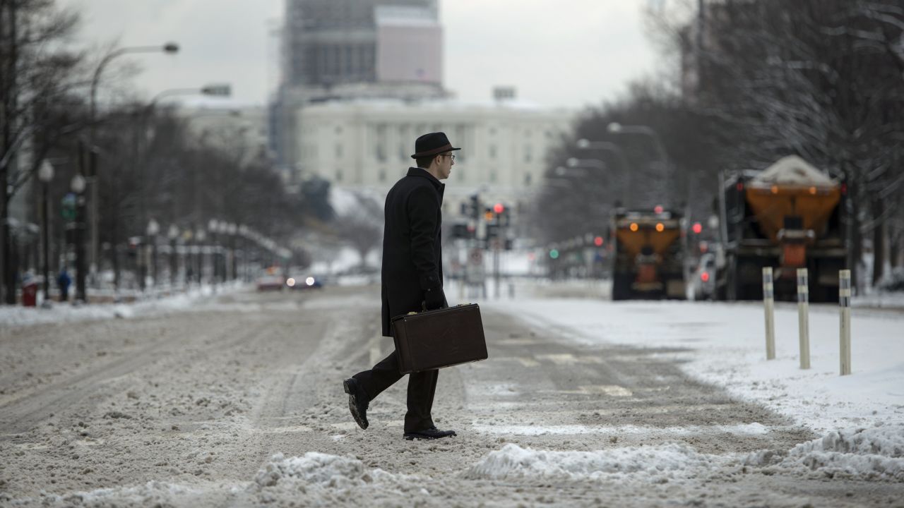 A man crosses a street near the U.S. Capitol in Washington on February 17.